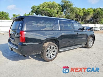 Trzecie zdjęcie samochodu z tyłu: 2016 CHEVROLET SUBURBAN C1500 LTZ VIN:1GNSCJKC8GR470688 - miniatura