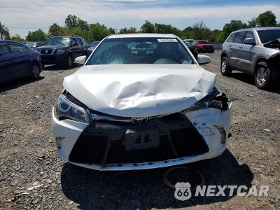 Piąte zdjęcie samochodu w środku: 2015 TOYOTA CAMRY HYBRID SE VIN:4T1BD1FK5FU161615 - miniatura