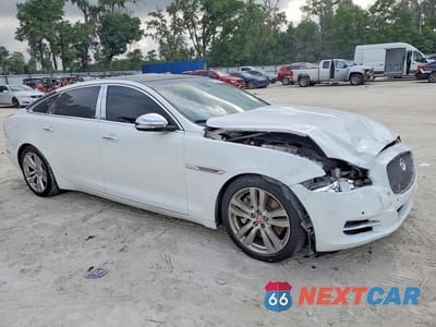 Czwarte zdjęcie samochodu z boku: 2014 JAGUAR XJL PORTFOLIO VIN:SAJWA2GZ3E8V73587 - miniatura