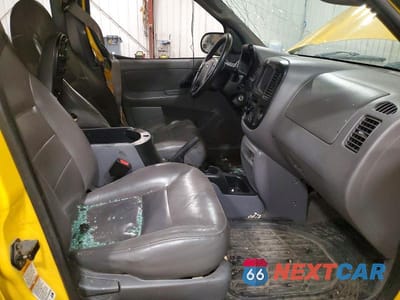 Zdjęcie 7 z 13 samochodu: 2001 FORD ESCAPE XLT VIN:1FMCU04141KA59090 - miniatura
