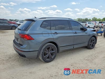 Trzecie zdjęcie samochodu z tyłu: 2023 VOLKSWAGEN TIGUAN SE R-LINE BLACK VIN:3VVCB7AX6PM140509 - miniatura