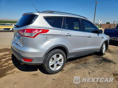 Trzecie zdjęcie samochodu z tyłu: 2014 FORD ESCAPE SE VIN:1FMCU0GX5EUB31523 - miniatura