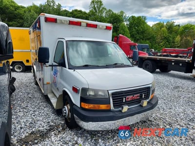 Czwarte zdjęcie samochodu z boku: 2014 GMC SAVANA CUTAWAY G4500 VIN:1GD675CL3E1124222 - miniatura