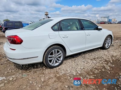 Trzecie zdjęcie samochodu z tyłu: 2019 VOLKSWAGEN PASSAT WOLFSBURG VIN:1VWLA7A3XKC012327 - miniatura
