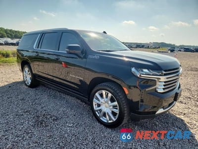 Czwarte zdjęcie samochodu z boku: 2021 CHEVROLET SUBURBAN K1500 HIGH COUNTRY VIN:1GNSKGKL3MR128485 - miniatura