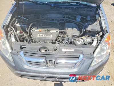 Zdjęcie 12 z 13 samochodu: 2003 HONDA CR-V LX VIN:JHLRD68413C000679 - miniatura