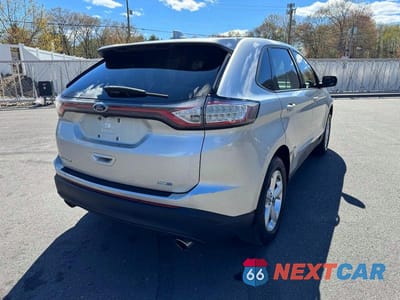 Trzecie zdjęcie samochodu z tyłu: 2017 FORD EDGE SE VIN:2FMPK4G90HBB08063 - miniatura