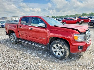 Czwarte zdjęcie samochodu z boku: 2016 GMC CANYON SLT VIN:1GTG6DE3XG1218152 - miniatura