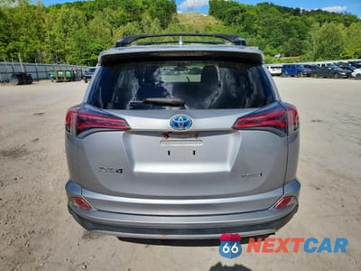 Zdjęcie 6 z 13 samochodu: 2018 TOYOTA RAV4 HYBRID LE VIN:JTMRJREV1JD259295 - miniatura