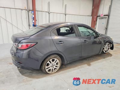 Trzecie zdjęcie samochodu z tyłu: 2017 TOYOTA YARIS IA BASE VIN:3MYDLBYV8HY160554 - miniatura