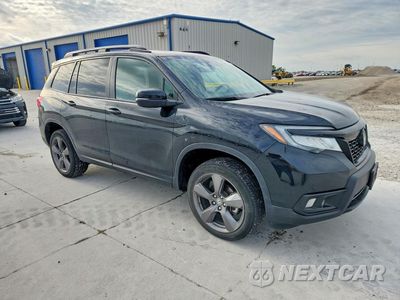 Czwarte zdjęcie samochodu z boku: 2021 HONDA PASSPORT TOURING VIN:5FNYF8H96MB040898 - miniatura