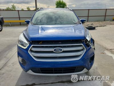 Piąte zdjęcie samochodu w środku: 2017 FORD ESCAPE TITANIUM VIN:1FMCU0J90HUF10802 - miniatura