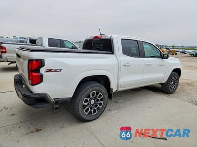 Trzecie zdjęcie samochodu z tyłu: 2024 CHEVROLET COLORADO Z71 VIN:1GCPTDEK5R1131875 - miniatura
