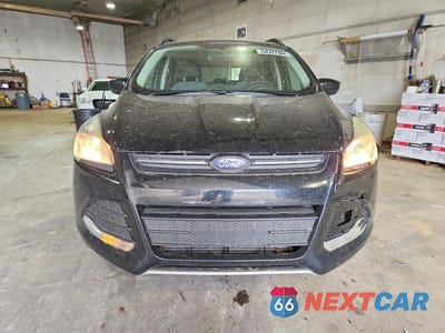 Piąte zdjęcie samochodu w środku: 2016 FORD ESCAPE SE VIN:1FMCU9G94GUA73476 - miniatura