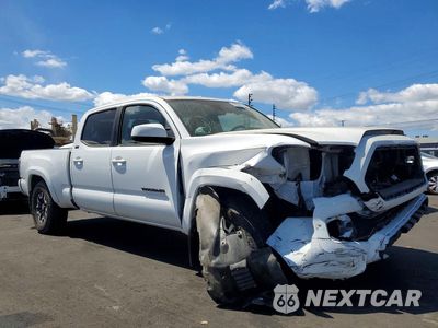 Czwarte zdjęcie samochodu z boku: 2022 TOYOTA TACOMA SR5 V6 VIN:3TMBZ5DN4NM035257 - miniatura