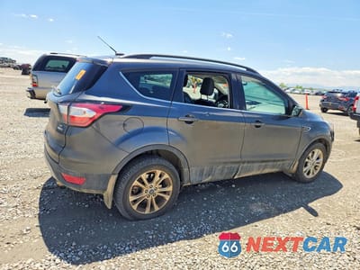 Trzecie zdjęcie samochodu z tyłu: 2018 FORD ESCAPE SE VIN:1FMCU9GD1JUB59369 - miniatura