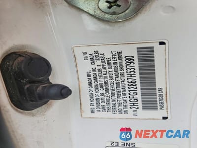 Zdjęcie 12 z 12 samochodu: 2007 HONDA CIVIC EX VIN:2HGFG12867H537980 - miniatura