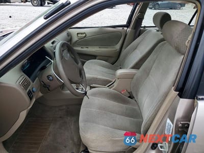 Zdjęcie 7 z 12 samochodu: 2002 TOYOTA COROLLA LE VIN:2T1BR12E72C562323 - miniatura
