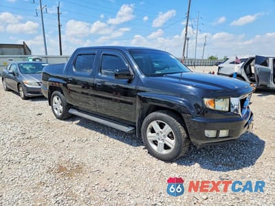 Czwarte zdjęcie samochodu z boku: 2011 HONDA RIDGELINE RTL VIN:5FPYK1F5XBB001982 - miniatura