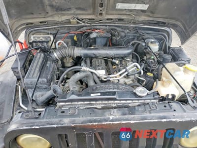Zdjęcie 11 z 12 samochodu: 2002 JEEP WRANGLER / TJ SPORT VIN:1J4FA49S62P719289 - miniatura