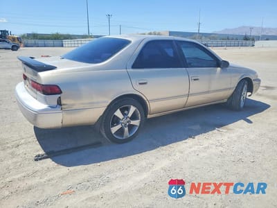 Trzecie zdjęcie samochodu z tyłu: 1999 TOYOTA CAMRY LE V6 VIN:JT2BF28K0X0170760 - miniatura