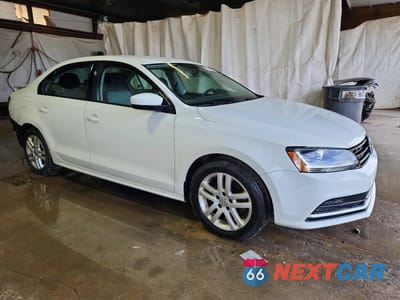 Czwarte zdjęcie samochodu z boku: 2018 VOLKSWAGEN JETTA S VIN:3VW167AJ0JM210872 - miniatura