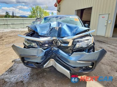 Piąte zdjęcie samochodu w środku: 2022 HONDA PILOT EXL VIN:5FNYF6H55NB032021 - miniatura