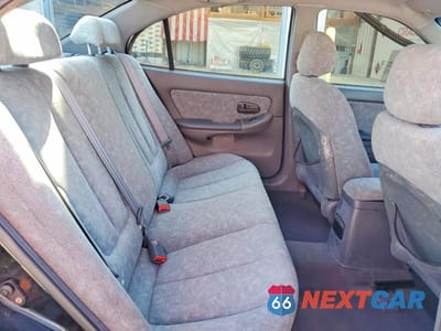 Zdjęcie 10 z 12 samochodu: 2002 HYUNDAI ELANTRA GLS VIN:KMHDN45D32U301746 - miniatura