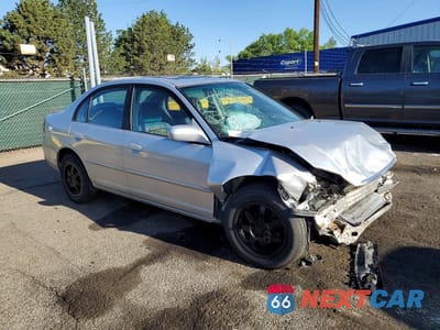Czwarte zdjęcie samochodu z boku: 2002 HONDA CIVIC EX VIN:1HGES26702L058886 - miniatura