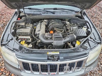 Zdjęcie 11 z 12 samochodu: 2012 JEEP GRAND CHEROKEE LAREDO VIN:1C4RJFAG3CC297514 - miniatura