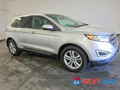 Czwarte zdjęcie samochodu z boku: 2015 FORD EDGE SEL VIN:2FMTK4J98FBC01143 - miniatura