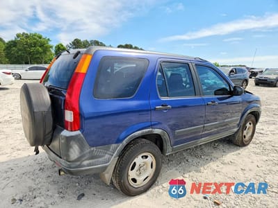 Trzecie zdjęcie samochodu z tyłu: 2002 HONDA CR-V LX VIN:JHLRD68402C003443 - miniatura