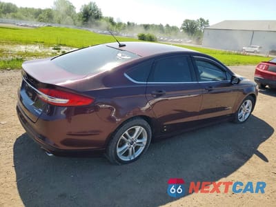 Trzecie zdjęcie samochodu z tyłu: 2018 FORD FUSION SE HYBRID VIN:3FA6P0LU3JR239134 - miniatura