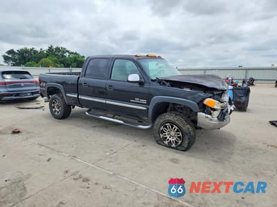 Czwarte zdjęcie samochodu z boku: 2001 GMC SIERRA K2500 HEAVY DUTY VIN:1GTHK231X1F145204 - miniatura