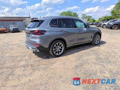 Czwarte zdjęcie samochodu z boku: 2026 BMW X5 XDRIVE40I VIN:5UX23EU00T9364487 - miniatura