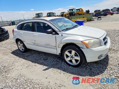 Czwarte zdjęcie samochodu z boku: 2009 DODGE CALIBER R VIN:1B3HB78B19D111630 - miniatura