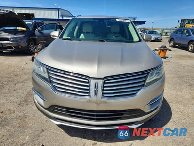 Piąte zdjęcie samochodu w środku: 2015 LINCOLN MKC VIN:5LMCJ1A9XFUJ10142 - miniatura