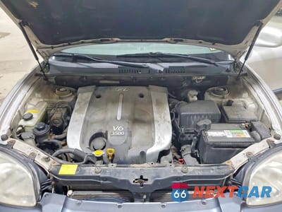Zdjęcie 12 z 13 samochodu: 2004 HYUNDAI SANTA FE GLS VIN:KM8SC73EX4U595062 - miniatura