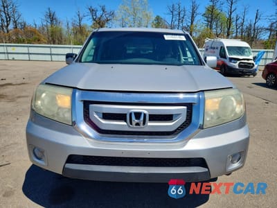 Piąte zdjęcie samochodu w środku: 2011 HONDA PILOT EXL VIN:5FNYF4H5XBB062938 - miniatura
