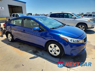 Czwarte zdjęcie samochodu z boku: 2018 KIA FORTE LX VIN:3KPFL4A72JE194365 - miniatura