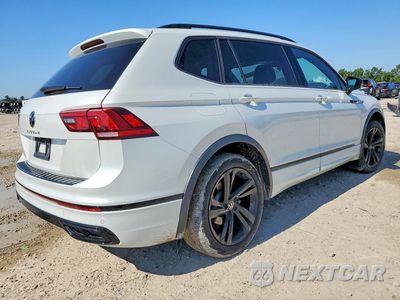 Trzecie zdjęcie samochodu z tyłu: 2023 VOLKSWAGEN TIGUAN SE R-LINE BLACK VIN:3VVCB7AX0PM069971 - miniatura