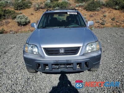 Piąte zdjęcie samochodu w środku: 1999 HONDA CR-V EX VIN:JHLRD1764XC008769 - miniatura