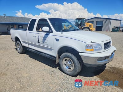 Czwarte zdjęcie samochodu z boku: 1998 FORD F150 VIN:1FTRX18L5WKA60330 - miniatura