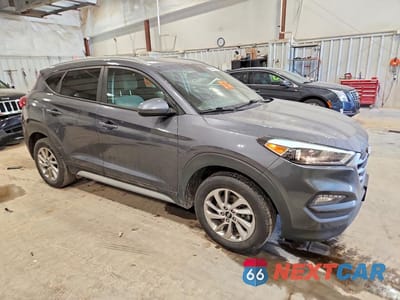 Czwarte zdjęcie samochodu z boku: 2017 HYUNDAI TUCSON SE VIN:KM8J3CA41HU482931 - miniatura