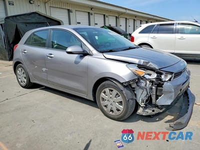 Czwarte zdjęcie samochodu z boku: 2023 KIA RIO S VIN:3KPA25AD1PE511408 - miniatura