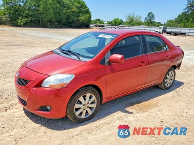 2009 TOYOTA YARIS BASE JTDBT903X94048660 - główne zdjęcie licytacji z USA - miniatura