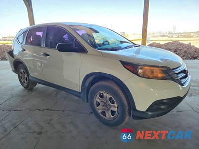 Czwarte zdjęcie samochodu z boku: 2012 HONDA CR-V LX VIN:2HKRM3H39CH514951 - miniatura