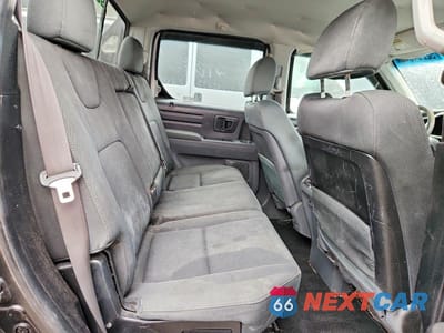 Zdjęcie 11 z 13 samochodu: 2008 HONDA RIDGELINE RT VIN:2HJYK16258H526705 - miniatura