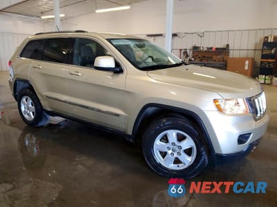 Czwarte zdjęcie samochodu z boku: 2011 JEEP GRAND CHEROKEE LAREDO VIN:1J4RR4GG7BC654660 - miniatura