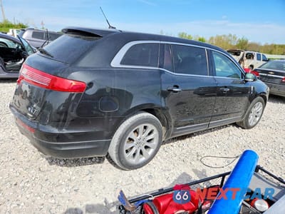 Trzecie zdjęcie samochodu z tyłu: 2014 LINCOLN MKT VIN:2LMHJ5AT5EBL53863 - miniatura